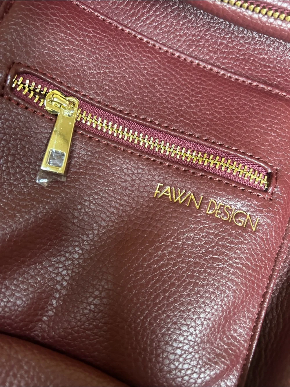 Fawn Design Pebbled Crossbody Backpack in Burgundy